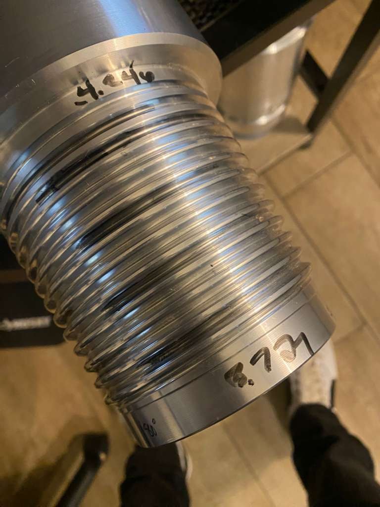 Machined threaded pin end with precision measurements